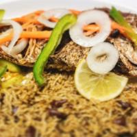 Escoveitched Fish · Red snapper seasoned and deep fried  served with basmati rice.