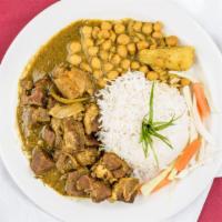 Curry Goat · Goat cooked to a tender perfection in a variety of herbs and served with basmati rice.