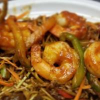 Pepper Shrimp Chow Mein · Shrimp  in a savory tomato sauce served over  chow mein with chunky veggies.