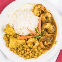 Curry Shrimp · Shrimp sautéed in fresh seasoning, cooked in Trinidad curry and served with basmati rice.