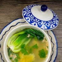 Wonton Soup · Chicken and pork wonton, Bok choy, topped with scallion and cilantro in chicken broth.