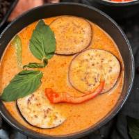 Red Curry · Gluten-Free. Medium Spicy. Red curry with coconut milk, carrots, bell peppers, bamboo, strin...