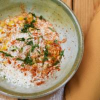 Esquites · Vegetarian, gluten-free. Roasted corn, chipotle, and queso fresco.