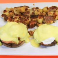 (8) Egg Benedict · 2 eggs dropped on english muffins, canadian bacon, and topped with hollandaise sauce and ser...