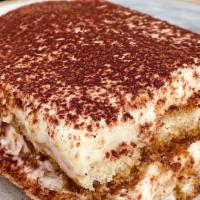 Tiramisu · Almond cake layered with marsala, decaf coffee, mascarpone and topped with powdered sugar an...