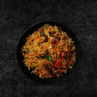 Veggie Delight Biryani (Vegan) · Our long grain basmati rice cooked with nuts, fresh vegetables and a choice of protein in ou...