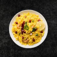 Tangy Lemon Rice (Vegan)  · Our long grain aromatic basmati rice, steamed to perfection and tempered with our house spec...