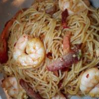 Shrimp Chow Mei Fun · Stir-fried noodle dish with shellfish.