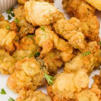 1/2 Pt. Fried Oysters · Briny, crunchy  oysters lightly battered and fried to a golden crisp.