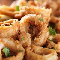 Fried Calamari · Refresh calamari lightly battered and fried to a golden crisp. Served with marinara sauce.