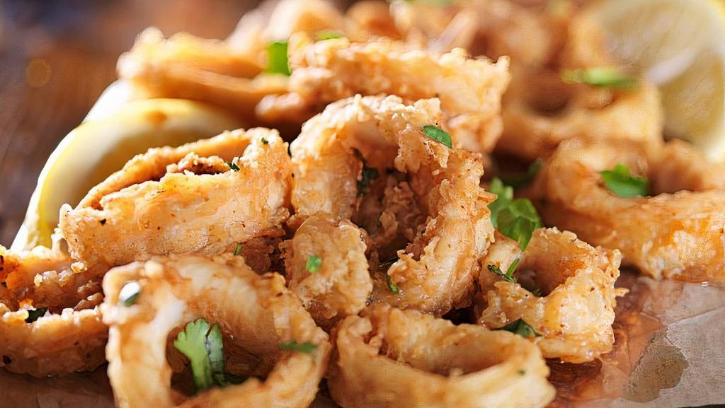 Fried Calamari · Refresh calamari lightly battered and fried to a golden crisp. Served with marinara sauce.