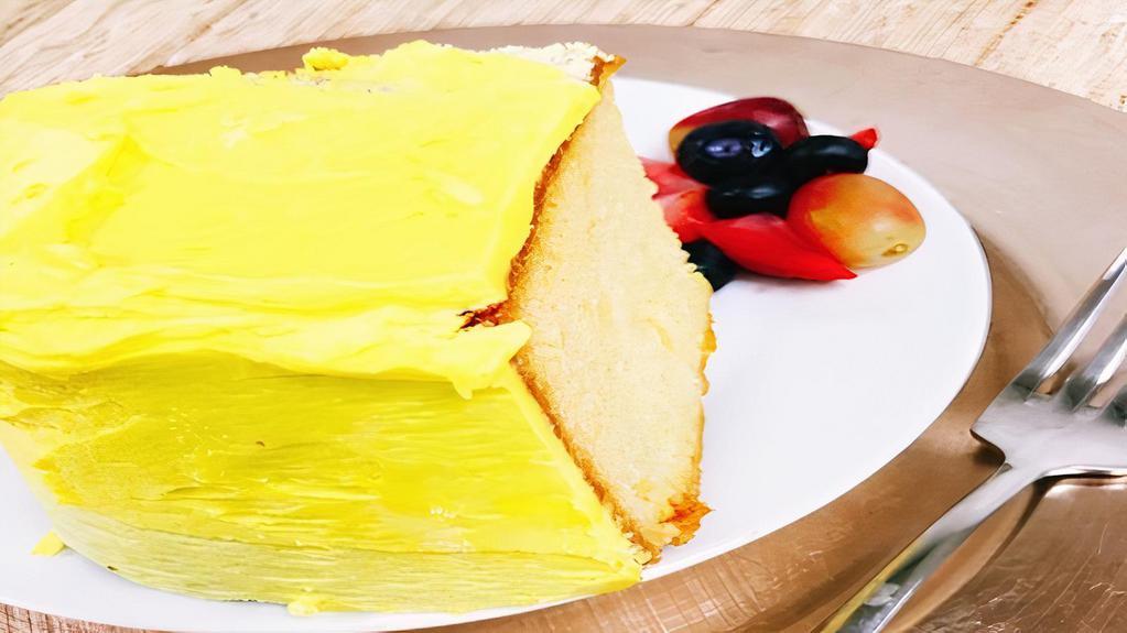 Yellow Cake With Lemon Icing · Moist yellow cake with vanilla flavor pairs perfectly with the lemon buttercream frosting for the perfect classic yellow cake!