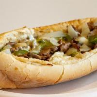 Steak Bomb · Philadelphia style cheese steak with sweet caramelized onions, grilled mushroom & grilled pe...
