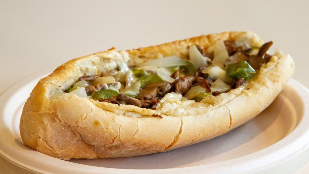 Steak Bomb · Philadelphia style cheese steak with sweet caramelized onions, grilled mushroom & grilled pepper