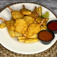Fried Shrimp · 8 pieces of Buttered Fried Shrimp served with French Fries.