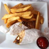 Chicken Wrap · Chicken Breast, Lettuce, Tomato, Grilled Onions, and Garlic Mayonnaise in Pita Bread. Comes ...