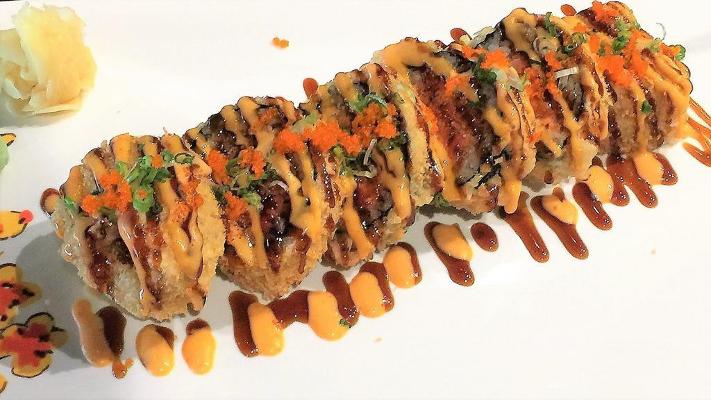 Crispy Spicy Tuna Roll · (In) lightly fried spicy tuna and avocado. (Top) masago, scallions, spicy mayo sauce and eel sauce.