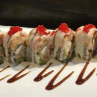 Monopoly Roll · (In) salmon tempura, avocado, and cream cheese. (Top) lobster salad, eel sauce, seafood sauc...