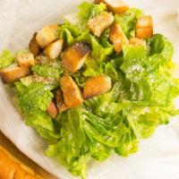 Caesar Salad · Fresh romaine lettuce, croutons, Parmesan cheese and homemade dressing.