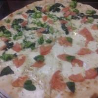 Caprese Pizza (Sicilian) · Fresh mozzarella, sliced tomatoes, fresh basil, olive oil.