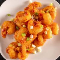 Firecracker Shrimp · Served with cherry peppers, garlic, tossed butter sauce.