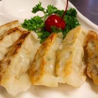  Pork Gyoza · Pan-fried dumpling pork.