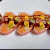 Yummy Roll · (In) tuna, salmon cucumber, and spicy mayo; (top) tuna, salmon, and eel with chef sauce.