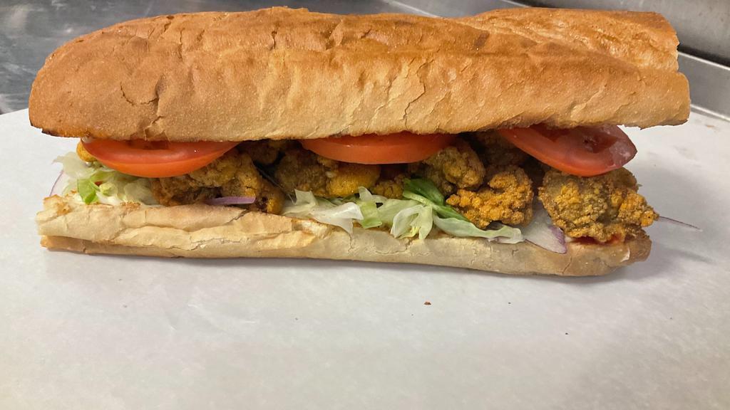 Fried Oyster Po-Boy With French Fries · Includes lettuce, tomato and mayonnaise.