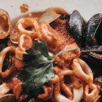 Frutti Di Mare · Shrimp, scallops, calamari, clams and mussels.