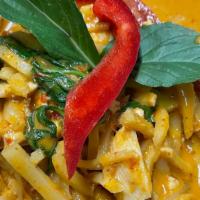 Red Curry · Spicy. Red curry paste with coconut milk, bamboo shoots, bell peppers, and Thai basil. (Medi...