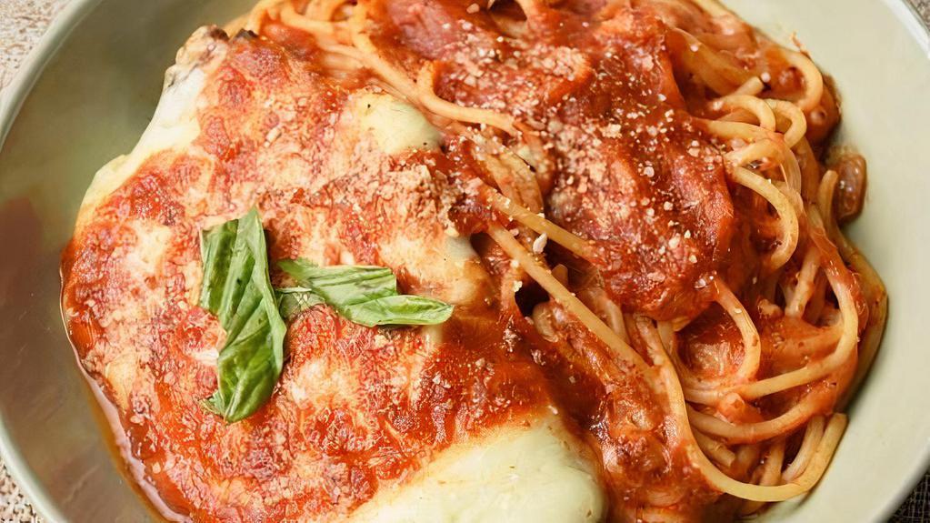 Chicken Parmesan · Served with marinara sauce with mozzarella.