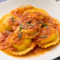 Cheese Ravioli · Served in a fresh tomato sauce.