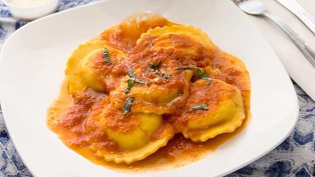 Cheese Ravioli · Served in a fresh tomato sauce.