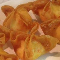 Crispy Crab Wontons (6 Pcs) · Crispy wontons filled with a creamy mix of kanikama, onions, and cream cheese served with a ...