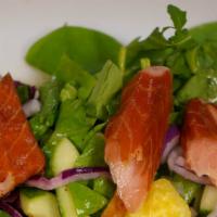Smoked Honey Salmon Salad  · pieces of smoked Canadian salmon, mixed greens, golden pineapple, 
cucumber, red onion, grap...