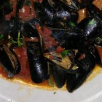 Mussels Rosso Or Bianco · Mussels in a garlic white wine sauce or in a marinara sauce.