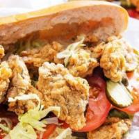 Seafood Po Boy · Fried shrimp. Scallops and oysters on a toasted sub roll.