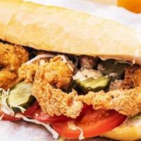 Sweet Chili Shrimp Po Boy · Fried jumbo shrimp tossed in a sweet chili sauce. Served on a toasted sub roll.