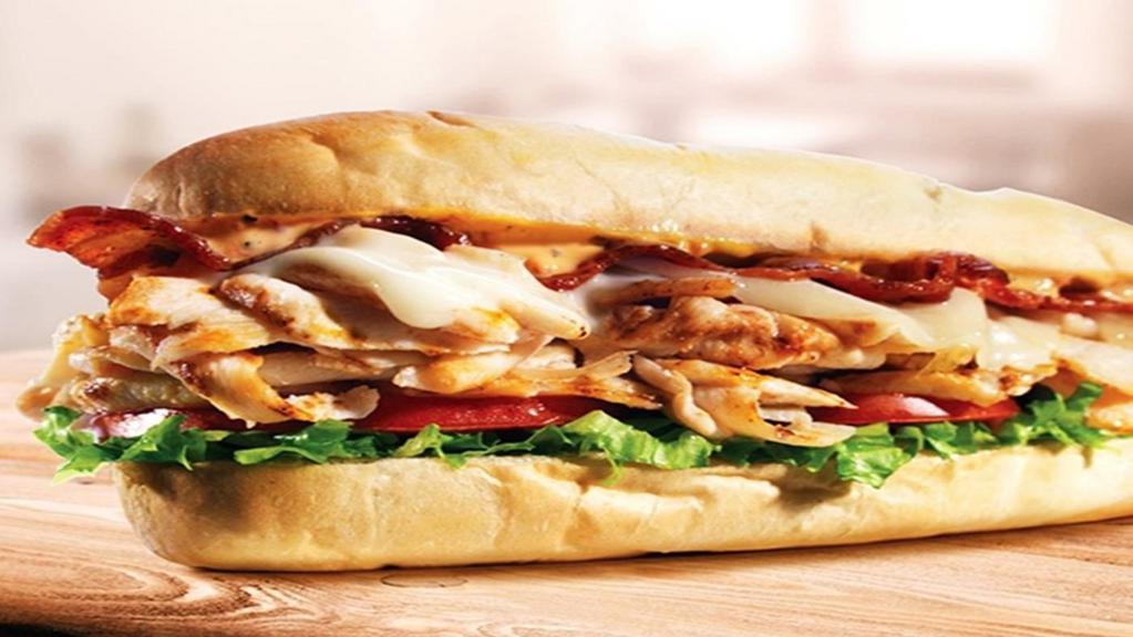 Chicken Cheesesteak · Philly chicken cheesesteak and melted provolone cheese on a toasted sub roll.