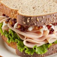 Oven Gold Turkey Breast · Oven gold turkey breast on your choice of bread.