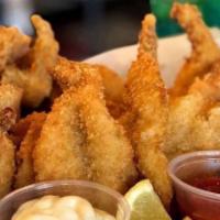 7 Fried Shrimp With Fries & Coleslaw · Jumbo shrimp coated in seasoned breadcrumbs, then deep fried to golden brown perfection. Ser...