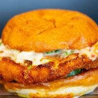 The Nashville Hot · Fried chicken, home made apple slaw, spicy house pickles and our Nashville hot style sauce. ...
