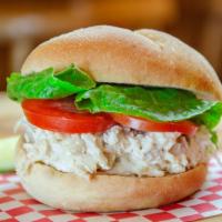 Specialty Sandwich #4 · Chicken salad, chive cream cheese, lettuce, tomato on a bulkie roll.