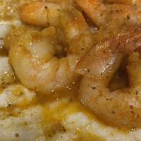 Shrimp & Grits · Sautéed shrimp over cheesy grits.