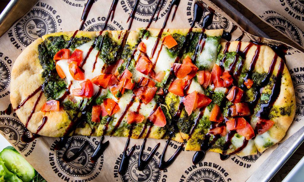Caprese Flatbread · Brewhouse Fave. Mozzarella, provolone, tomatoes, basil, and IPA pesto drizzled with extra virgin olive oil and sprinkled with salt & black pepper.