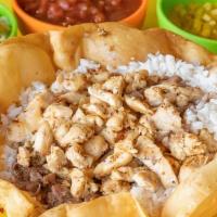 Taco Bowl · Deep fried taco shell with rice, beans, meat & you choose your toppings.