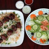 Beef Tikka Kabab · 2.beef  tikka skewer with rice, side of salad and white sauce