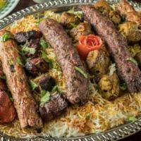 52….Grill Kabab Special (10 Skewers) · Serves 5 people with rice, 2 chicken kofta, 2 chicken tikka, 2 beef kofta, 2 beef tikka,2 la...