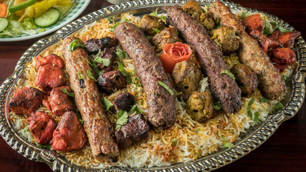 52….Grill Kabab Special (10 Skewers) · Serves 5 people with rice, 2 chicken kofta, 2 chicken tikka, 2 beef kofta, 2 beef tikka,2 lamb tikka