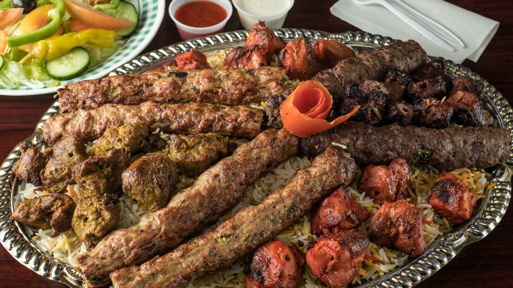 53….Grill Kabab Special (12 Skewers) · Serves 5-6 people with rice, 3 chicken kofta, 3 chicken tikka,2 lamb tikka, 2 beef kofta,2 beef tikka